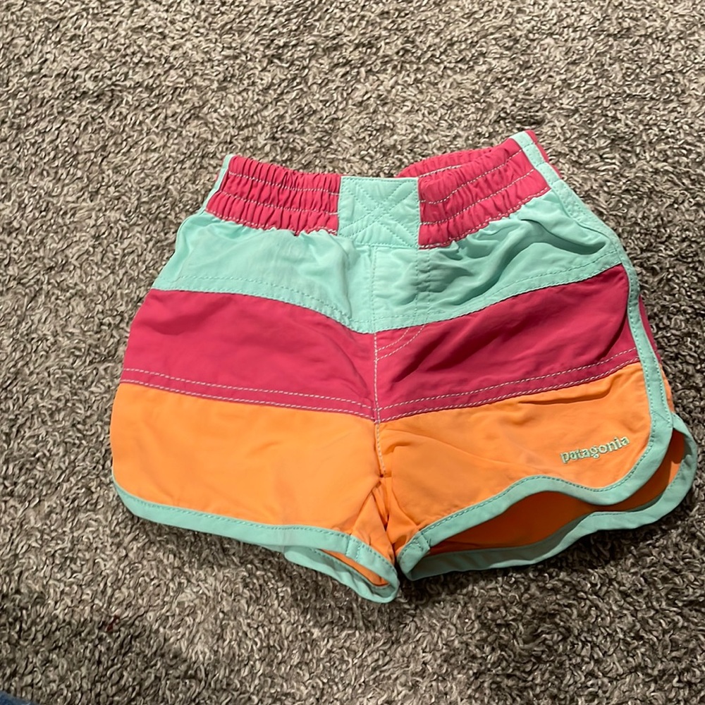 Patagonia board shorts 12-18months. Excellent condition.